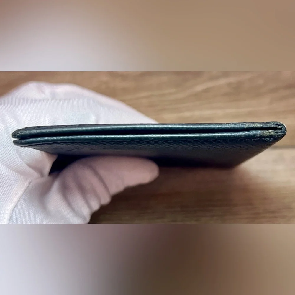 LOUIS VUITTON Black Taiga Leather Bi-fold Wallet